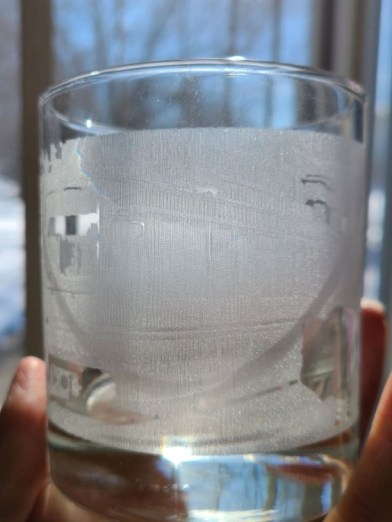 Photo of whiskey tumbler engraved poorly