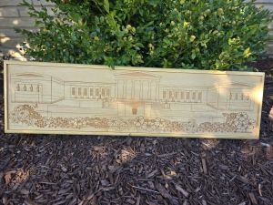 Custom wooden sign showcasing an intricate laser-engraved scene of Buffalo, New York's Art Gallery. Each sign is custom framed in polished wood, reflecting the craftsmanship and artistry behind their creation.